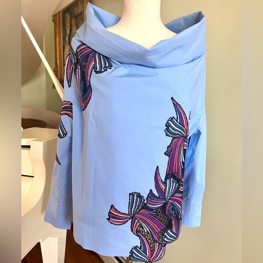 Emilio Pucci light blue blouse with floral embroidery.